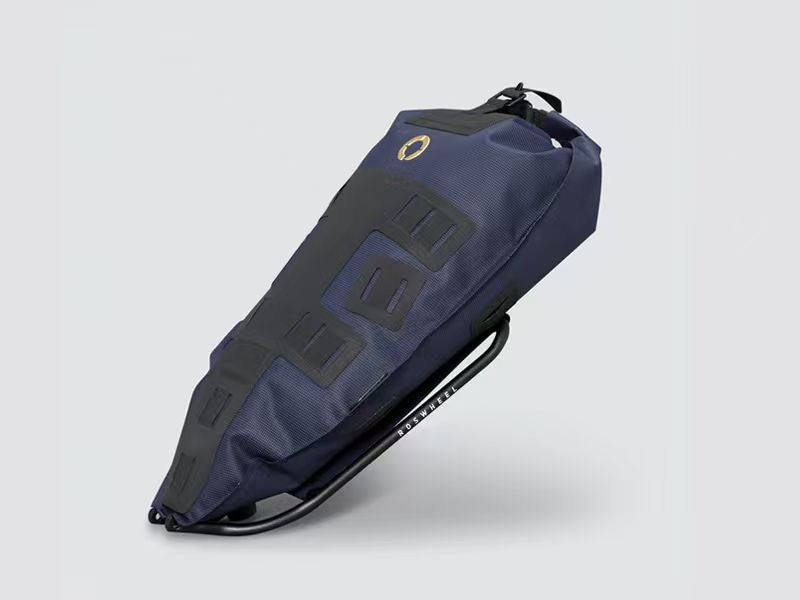 Off-Road Seat Pack Medium designed for weekend adventures, featuring waterproof construction, M.O.L.L.E. attachment system, and a stable adjustable rack for secure fitting.