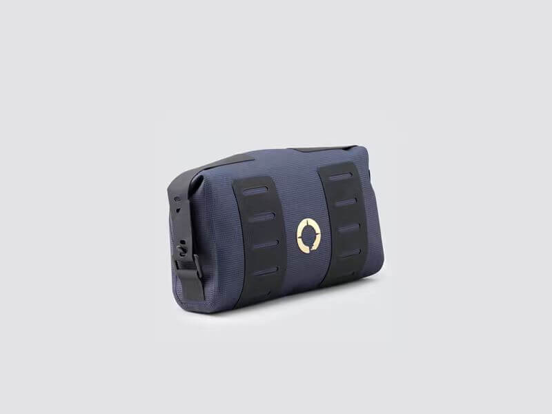 Off-Road Tool Pouch with waterproof design, inner zip pocket for organization, and M.O.L.L.E. system for flexible attachment options on the bike.