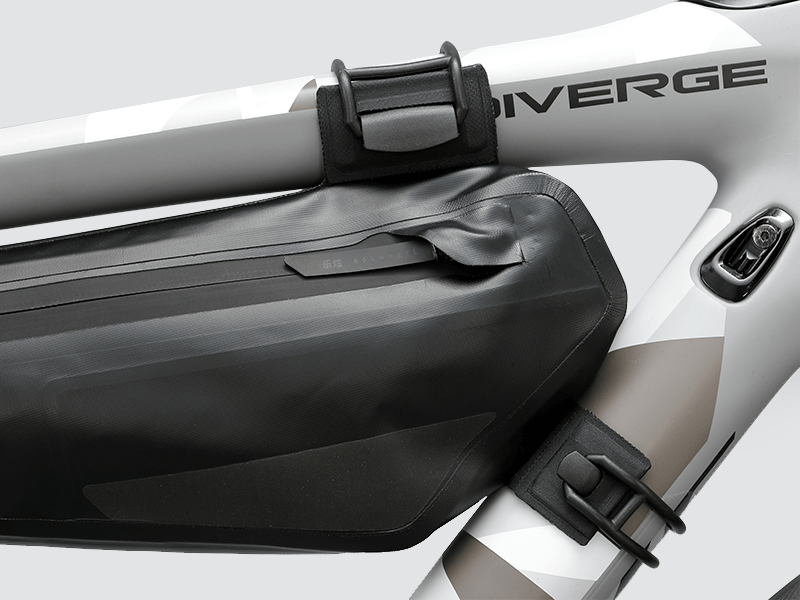 Road Frame Bag XSmall designed for weight distribution and easy access to small items, featuring 'Fast-Fix' straps, reflective areas, and lightweight construction.