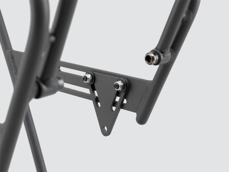 Tour front rack for balanced load carrying, compatible with most disc brake bikes and forks.