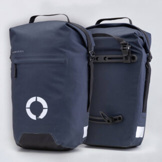 Waterproof Tour pannier bags (40L pair) with quick-tighten closure and reflective features for long-distance touring.